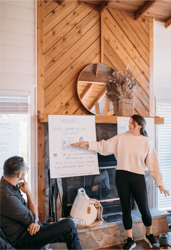 Aux teammates presenting ideas during a working session